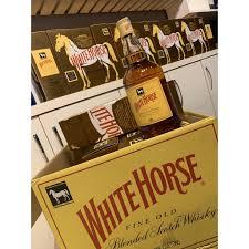 WHITE HORSE 1L CX (NA CAIXA A UNIDADE SAI POR 63,99 )