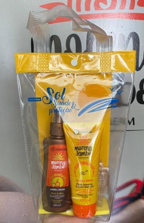 KIT OLEO BRONZEADOR 120ML MJ+LOÇAO DOURA PELOS 100ML MJ+ BOLSINHA COM PORTA CELULAR DERMACREAM