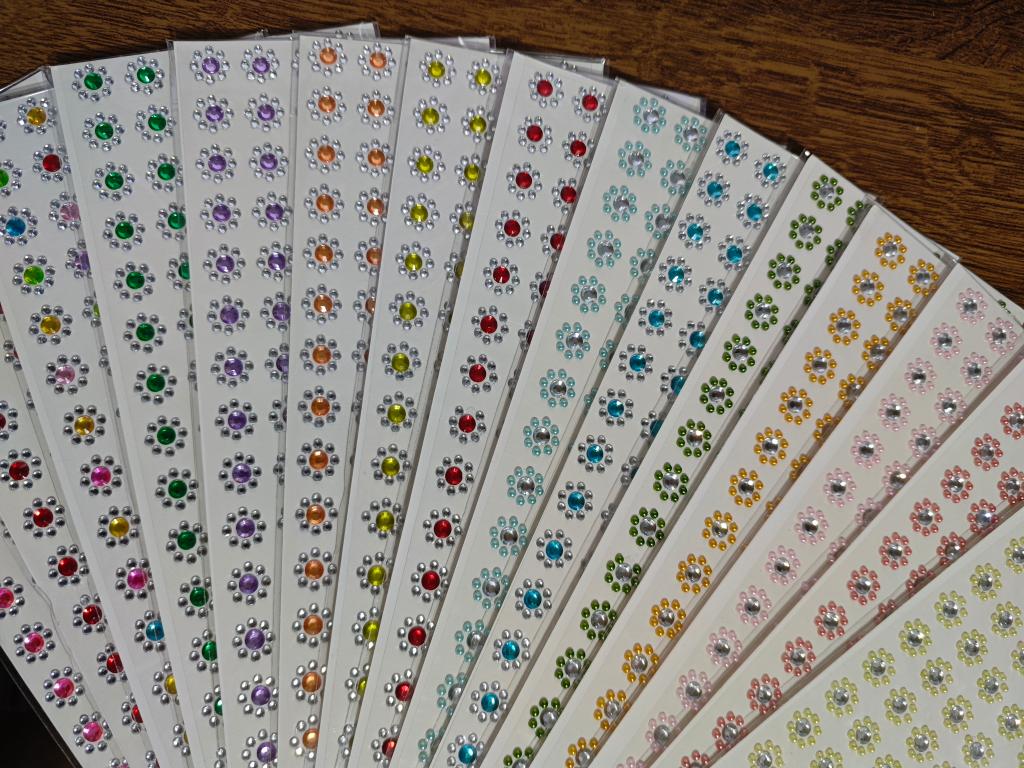 AD96 - ADESIVO FLOR CRISTAL - 96 UNIDADES (MODELO E COR SOB CONSULTA)