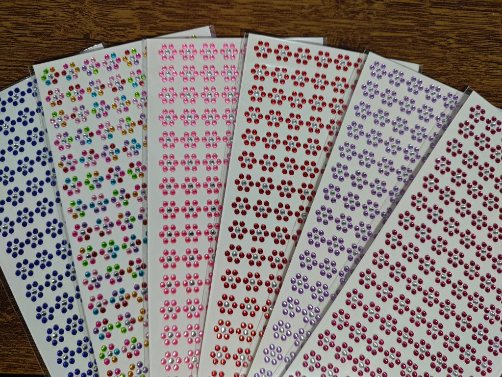 AD160 - ADESIVO FLOR CRISTAL - 160 UNIDADES (MODELO E COR SOB CONSULTA)