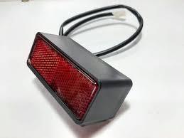 CONJUNTO LUZ DE PLACA TITAN/FAN 125/150 14/15 -TITAN/FAN/START 16/25 - COM FIACAO