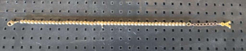 PULSEIRA DE BOLINHA PASSADA COM FINALIZADOR LETRA